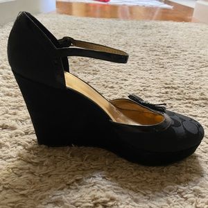 Gently used, Coach Mary Jane wedge heels, black with black embossed C logo.